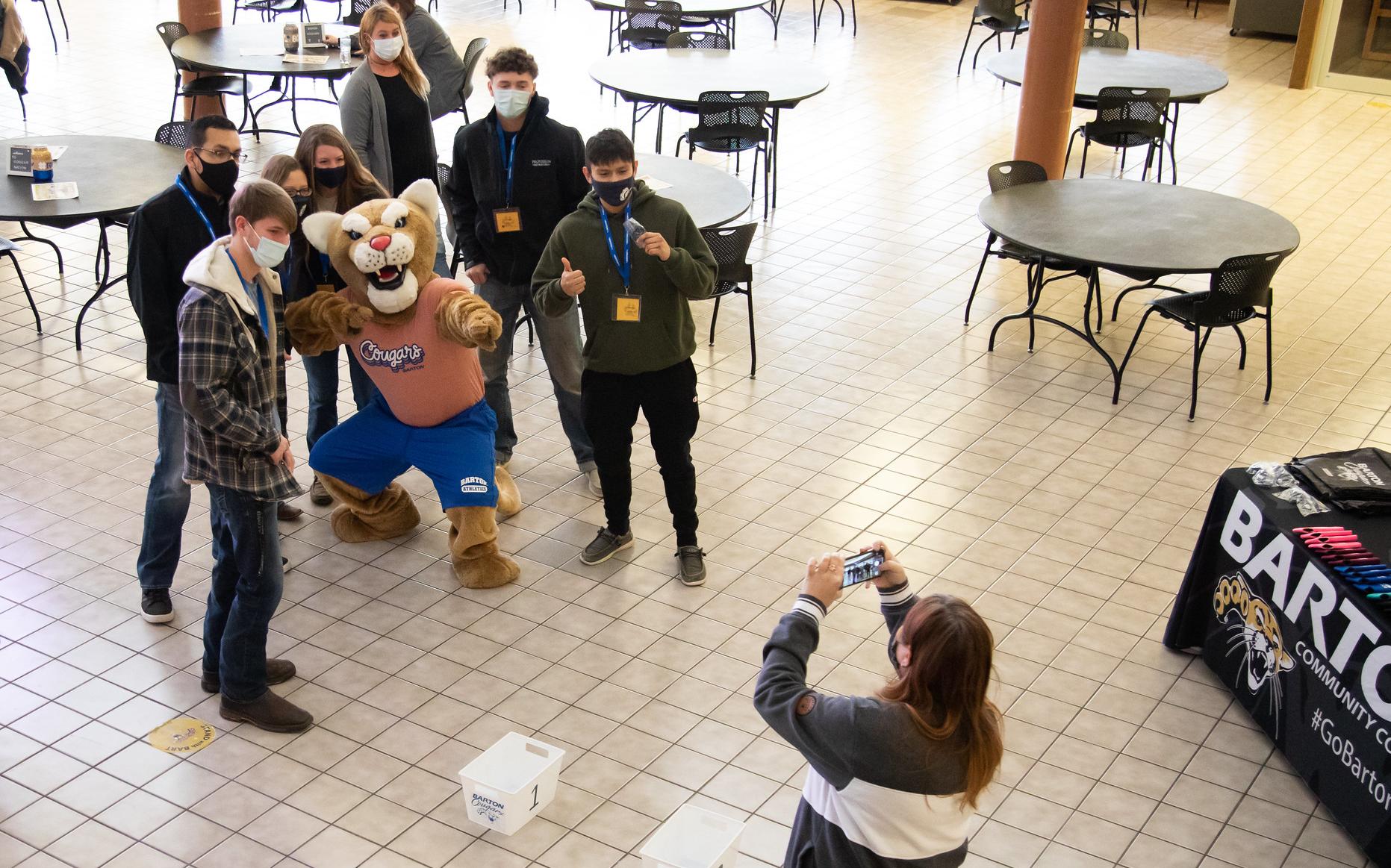 students taking a photo with bart