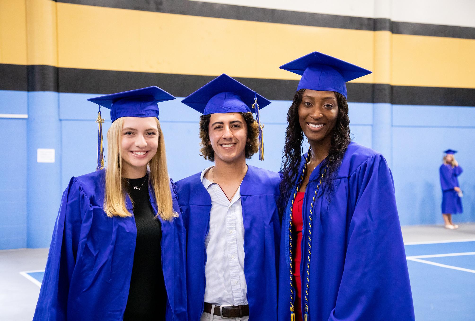 students in caps and gowns